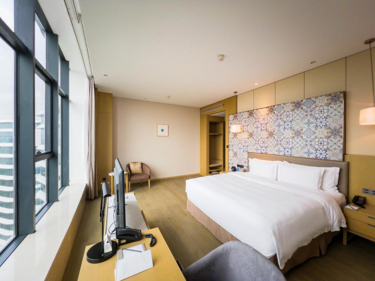 Отель Wyndham Grand Plaza Royale Yuzhou Xiamen Wuyuan Bay Экстерьер фото