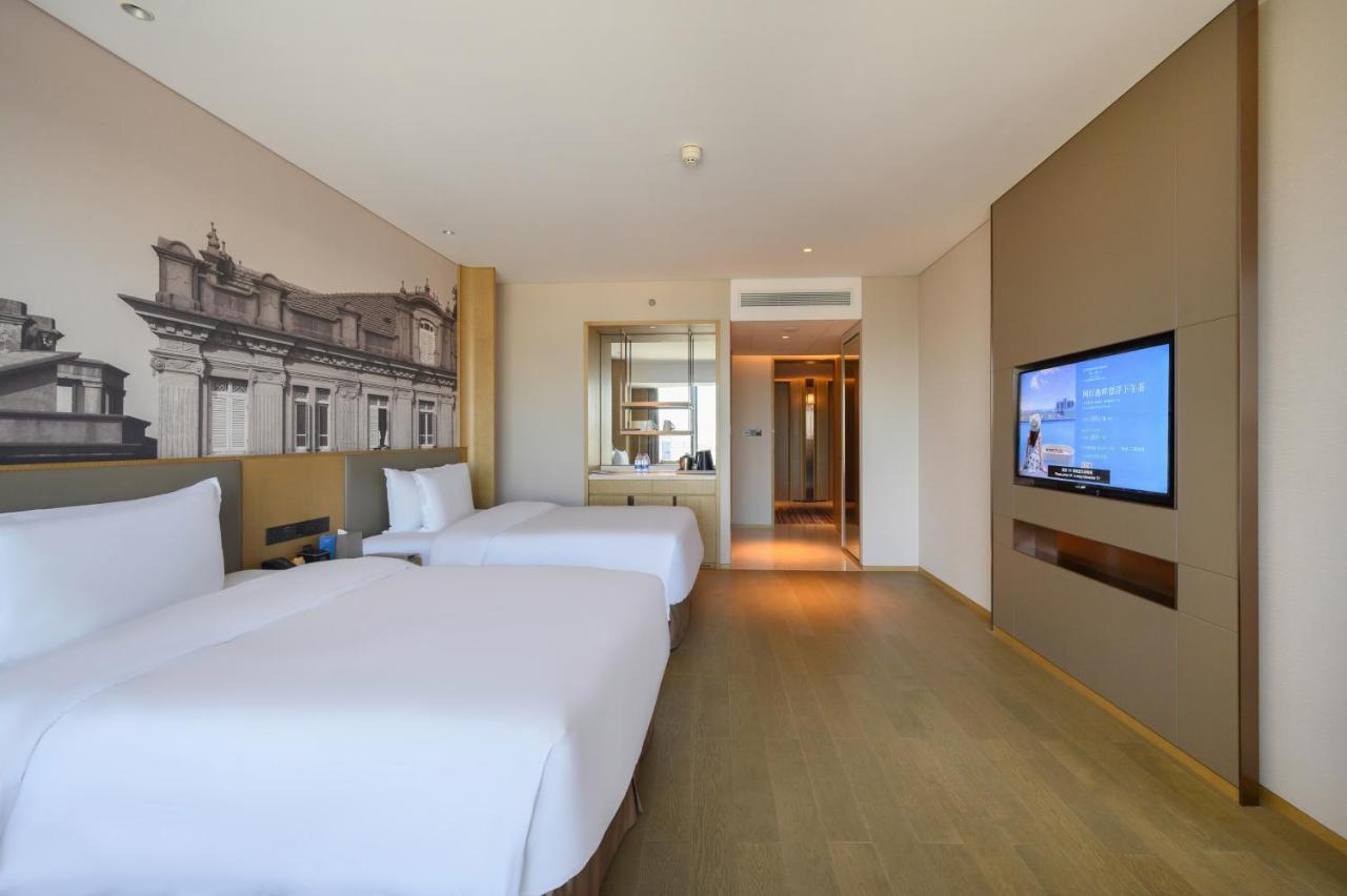 Отель Wyndham Grand Plaza Royale Yuzhou Xiamen Wuyuan Bay Экстерьер фото