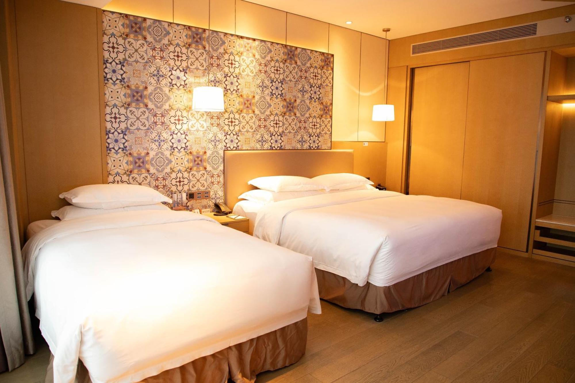 Отель Wyndham Grand Plaza Royale Yuzhou Xiamen Wuyuan Bay Экстерьер фото