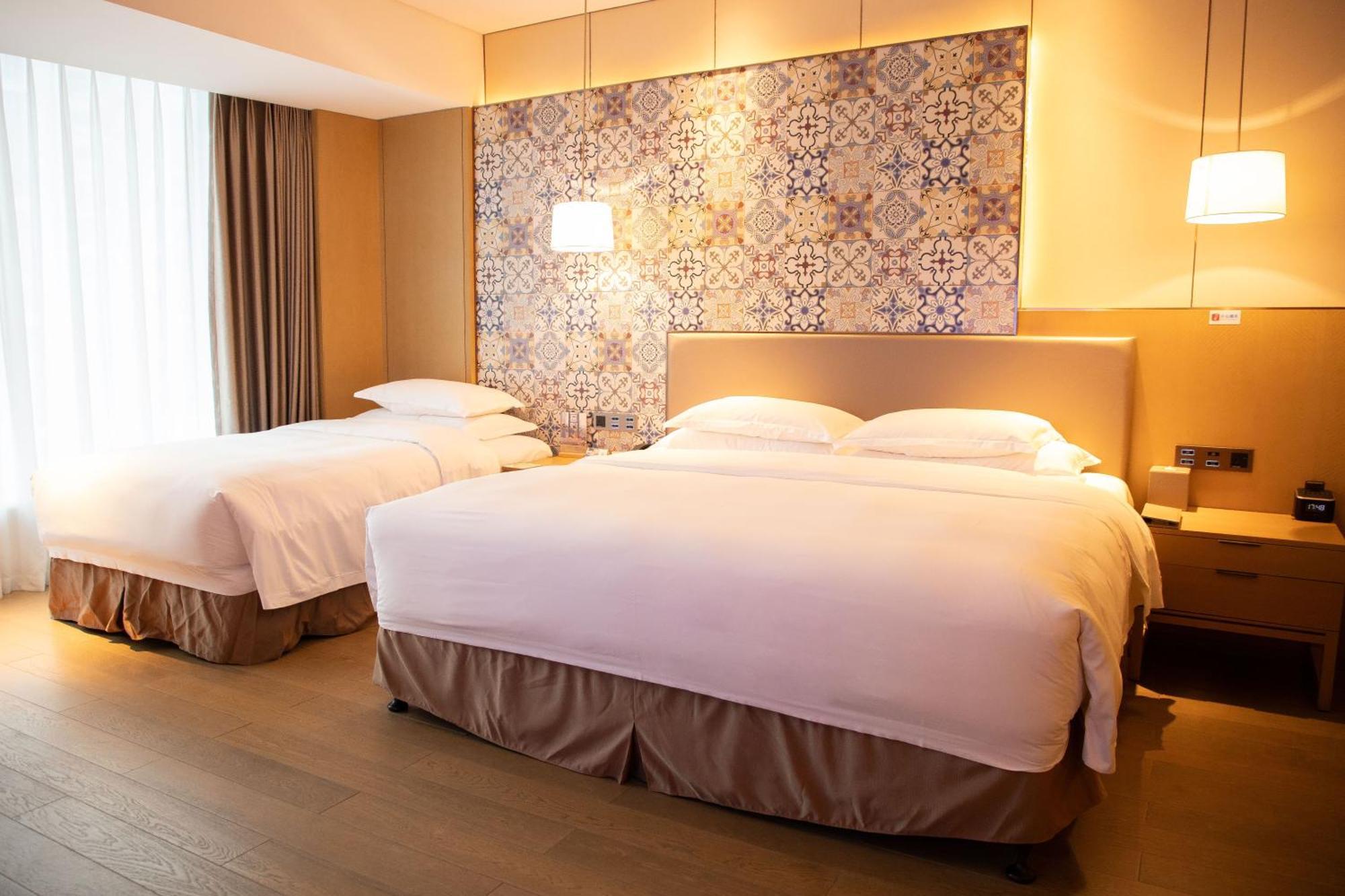Отель Wyndham Grand Plaza Royale Yuzhou Xiamen Wuyuan Bay Экстерьер фото